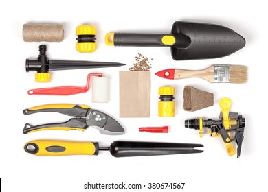 Garden Tools And Essentials On White Background Top View. Gardening Flat Lay Concept