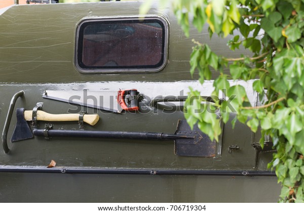 Garden tools on a military\
machine