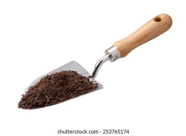 Garden Trowel With Potting Soil Isolated On White With A Clipping Path. The Image Is In Full Focus, Front To Back.