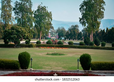 A garden view , mountains in background