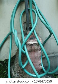 Garden Water Hose On The Wall