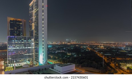 Garden In Zabeel District With Office Skyscrapers On A Background Aerial Timelapse In Dubai, UAE. Traffic On Streets With Illuminated Villas And Hotels