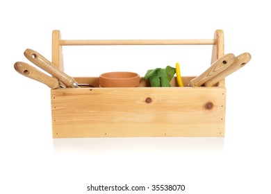 A Gardener's Tote Box On A White Background With Tools, Plants And Gloves