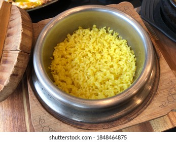 A Gardenia Pot Rice Set. Yellow Rice