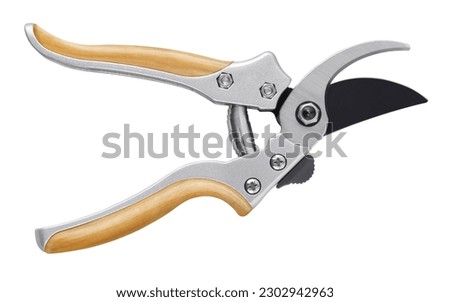Gardening tool equipment. Single steel garden scissor with wooden grip for pruned or plants, and flowers garden work. Pruning of vineyard or fruit tree. Top view isolated on white with clipping path 