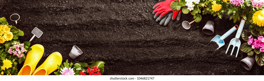 Gardening Tools On Soil Background. Spring Garden Works Concept