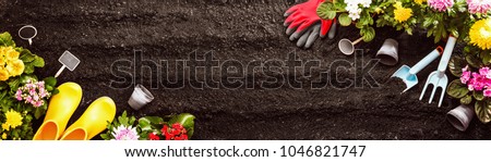 Gardening Tools on Soil Background. Spring Garden Works Concept