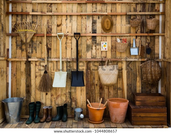 Gardening tools in the\
shed, tool concept
