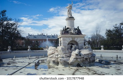 Gardens of the city of Aranjuez, located in Spain. Stone palace and beautiful autumn landscapes with beautiful fountains and mythological figures
