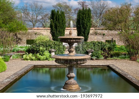 The gardens of a stately home, featuring a Fountain.