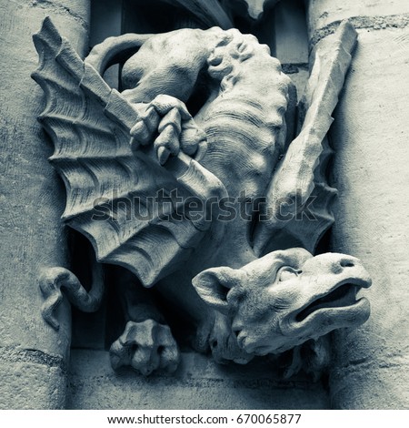gargoyle in black and white on the cathedral of seville, Andalusia spain