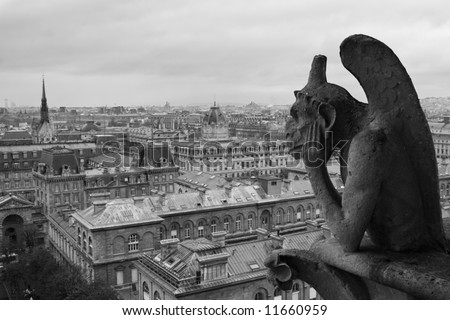 Gargoyle on Notre Dame overlooking Paris