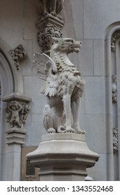 Gargoyle Sculpture In A Building Principal Door.