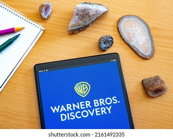 Garham, Bavaria, Germany - May 28, 2022: In This Photo Illustration Warner Brothers Discovery Logo Seen Displayed On A Tablet