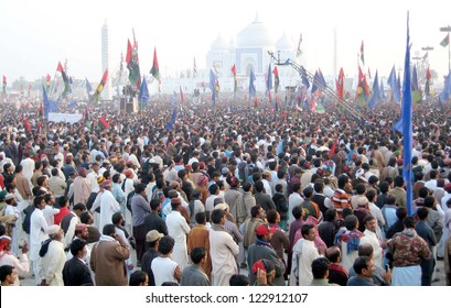 GARHI KHUDA BUX, PAKISTAN - DEC 27: Supporters Of Peoples Party Are Present During Public Gathering On Occasion Of The Death Anniversary Of Benazir Bhutto On December 27, 2012 In Garhi Khuda Bux.