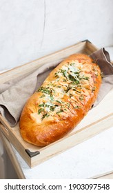 Garlic Bread With Cheese And Herbs On Wooden Box, Light Grey Background