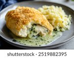 garlic butter chicken kiev and mashed potatoes