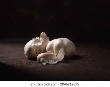 Garlic Clove Against A Black Background, Herbal Medicine For Heart And Blood Pressure, The Common Cold