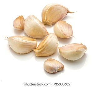 Garlic cloves isolated on white background separated - Powered by Shutterstock