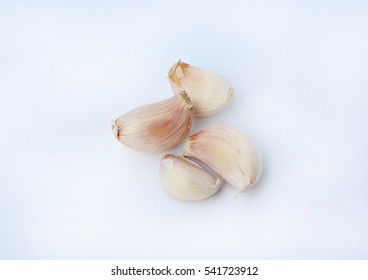 Garlic Cloves On White Background