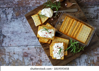 Garlic crackers with cream cheese. Appetizing snack. Keto snack. Selective focus. Macro. - Powered by Shutterstock