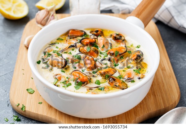 Garlic mussels in sour cream sauce. Pasta or\
spaghetti sauce.