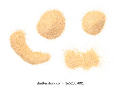 Garlic powder isolated on white background. Flat lay, top view. Slight shadow