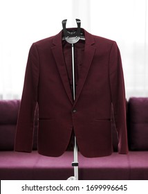 Garment Steamer Burgundy Jacket. Macro