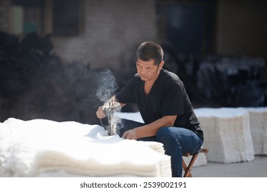 Garment workers are preparing polyester material