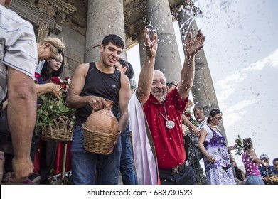 Garni, Armenia - July 23, 2017: Armenian Pagan Priest Splashing Water On People On Feast Of Vardavar At Garni Pagan Temple