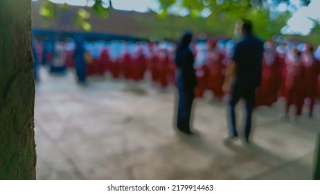 Garut, Indonesia - July 18, 2022 : Photo Blur Background Islamic Integrated Elementary School Students Line Up For The Morning Apple Ceremony For The Indonesian Flag Ceremony On Monday At Their School