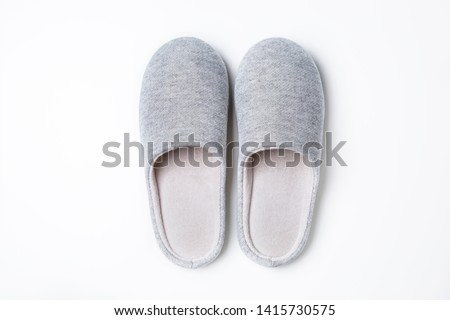 Gary house slipper isolated on white background.