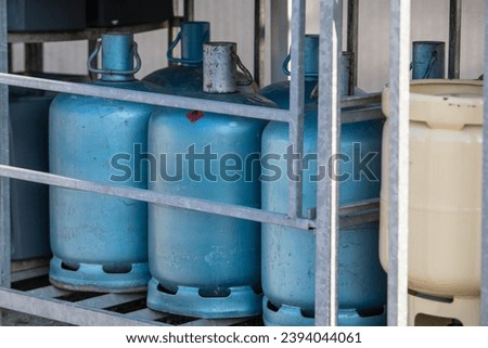 Gas bottle container in a store