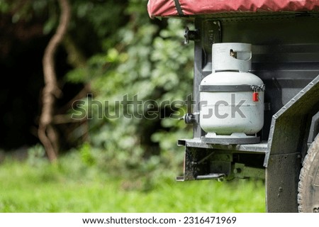 Gas bottle on a camper trailer while camping in the bush Foto stock © 