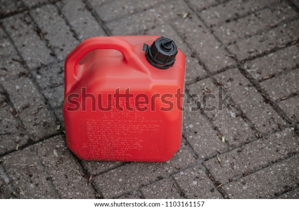 Gas can\
red plastic gallon fuel storage cap\
portable