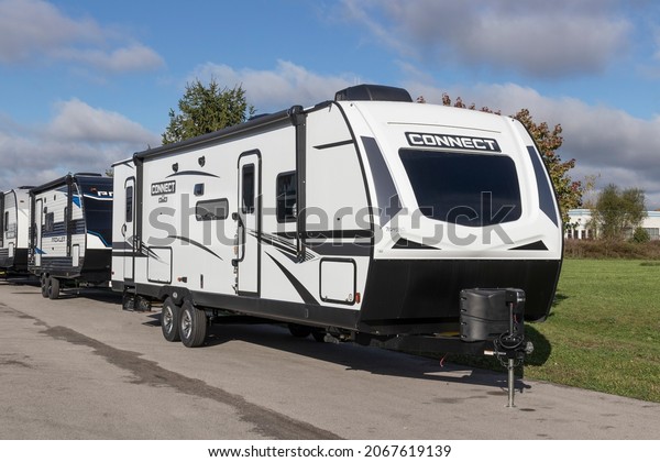 Gas\
City - Circa October 2021: Connect lightweight travel trailers by\
KZ for sale. KZ is a subsidiary of Thor Industries and manufactures\
different lines of RV, motor homes and fifth\
wheels.