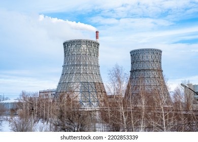 Gas Combined Heat And Power Plant With Huge Pipes, Smoke, Steam, Power Stations On A Frosty Winter Day. The Use Of Natural Gas In The Heat And Power Industry. Blue, Cloudy Sky.