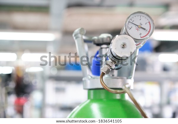 Gas cylinders with pressure gauge in
a specialized laboratory. Laboratory
material.