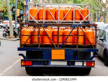 Gas Delivery. Truck With Orange Propane Gas Tanks