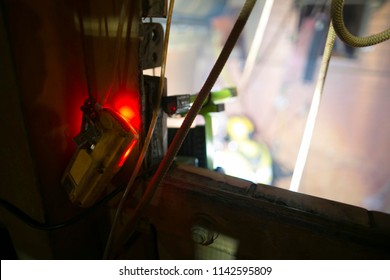 Gas Detector Detecting Trigger Warning Alarm Hydrogen Sulfide In Confined Space While Rope Access Worker Doing Welding Hot Work Construction Site Sydney, Australia