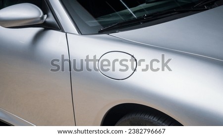 Gas door on a car fender