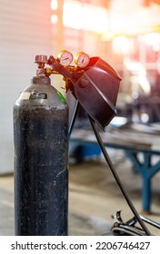 Gas factory cylinder. Factory compressed gas container. - Shutterstock ID 2206746427