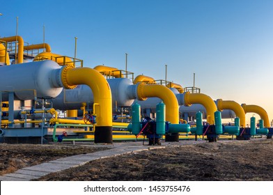 Gas filters-separators with valves on a blue sky background.