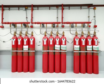 Gas Fire Suppression system of indoor switchgear for an electrical substation. (The meaning of big Thai words at Fire Suppression tank: DANGER) - Shutterstock ID 1644783622