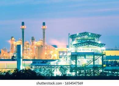 Gas Fired Power Plant And Factory Building At Night. Also Called Gas Fired Power Station Or Natural Gas Power Plant. That Technology To Burn Natural Gas And Generate Electricity Or Electrical Energy.