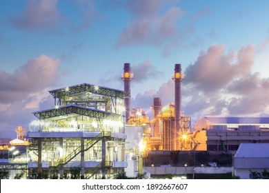 Gas Fired Power Plant And Factory Building At Night. Also Called Gas Fired Power Station Or Natural Gas Power Plant. That Technology To Burn Natural Gas And Generate Electricity Or Electrical Energy.