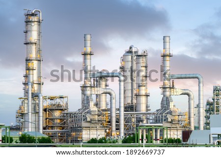Gas fired power plant and factory building at night. Also called gas fired power station or natural gas power plant. That technology to burn natural gas and generate electricity or electrical energy.