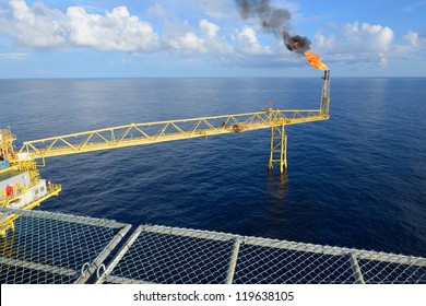 The Gas Flare Is On The Oil Rig Platform.