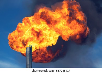 Gas flaring. Burning of associated gas at oil production.