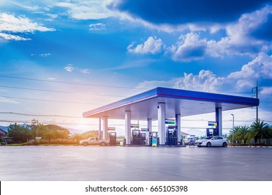 Gas fuel station with clouds and blue sky - Shutterstock ID 665105398